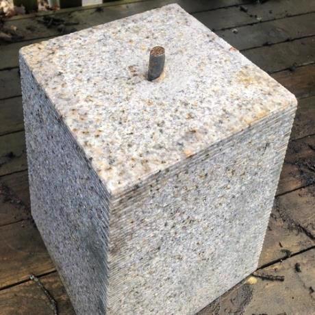 Granite, tapered square, staddle stone with iron pin