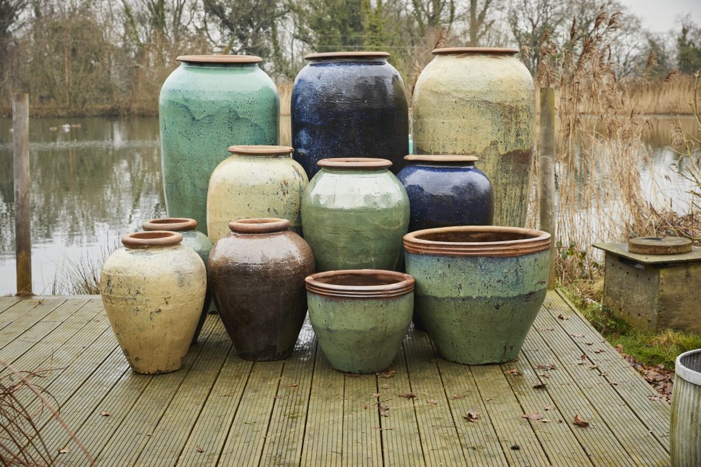 Ceramic pots beside lake