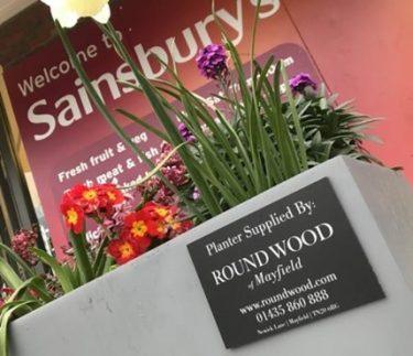 Round Wood planters help brighten local Supermarkets